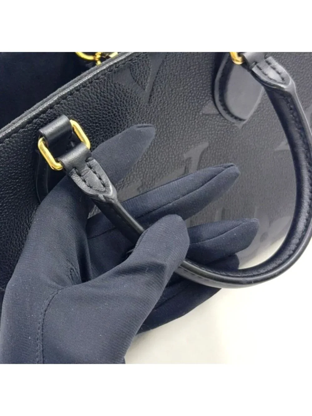 Louis Vuitton On The Go PM Monogram Empreinte Calfskin Black Handbag Gold